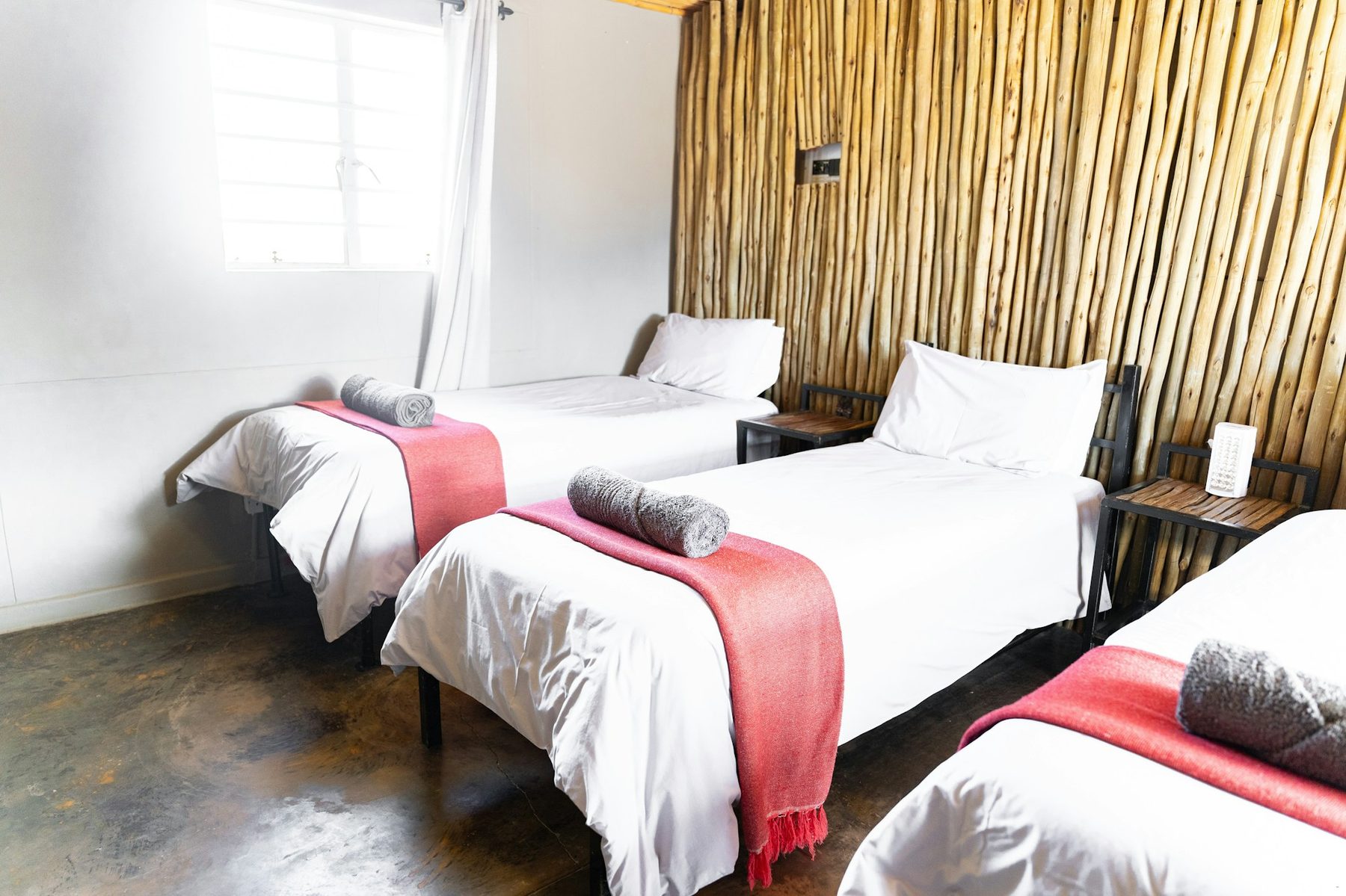 Twin beds made up in the suite